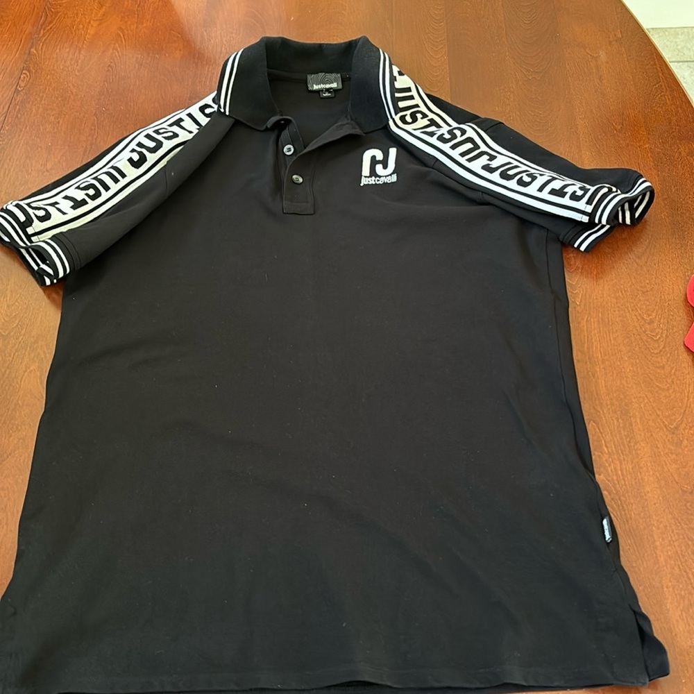 Just Cavalli polo size M in black writing in white